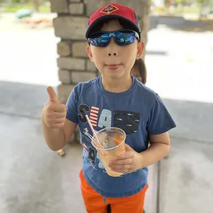 Orange float, thumbs up.