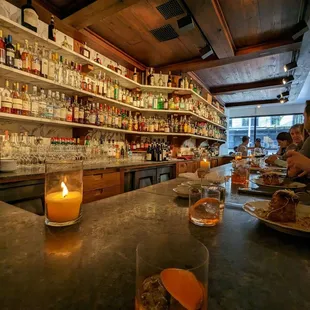 people sitting at a bar