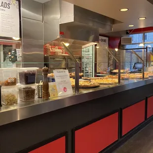 a view of a pizza counter