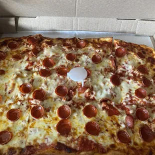 Tonight's feast! We get two dinners and one lunch for me at work out of one $18 pie. And it's delicious!