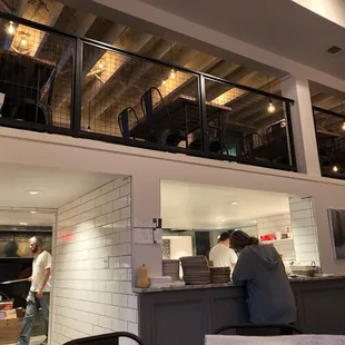 The kitchen and upstairs seating.