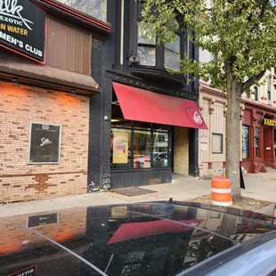 Don't walk into the strip club next door and try to order a slice of pizza. They don't think it's funny.