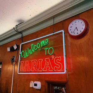 Neon sign in the entrance to the dining room (great atmosphere!)