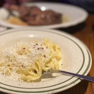 Hubby got 14oz bone in Oak Grilled Veal Chop w/Fettuccine Alfredo. Incredible. Better than Gene &amp; Georgetti's in Chicago. Perfection :)..
