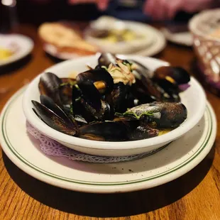 Mussels in HEAVENLY GARLICKY BUTTER WINE SAUCE changed our life. Botta Boom Bing. We R younger/better looking now after eating these :)...