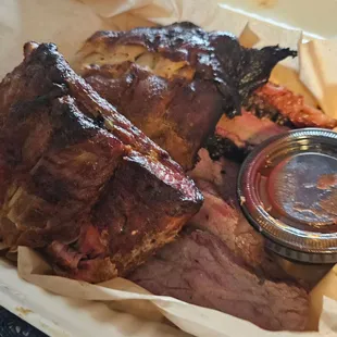 Baby back pork ribs, tri tip, and brisket.