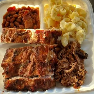 SLOW SMOKED BABY BACK RIBS WITH OUR HOMEMADE SIDES OF SMOKED BEANS AND CREAMY MAC AND CHEESE