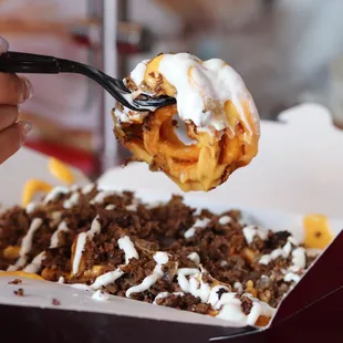 a person eating a waffle