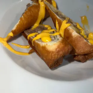 Steak and cheese egg rolls