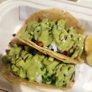 Al pastor and carne asada taco