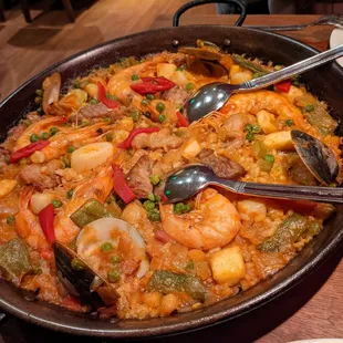 PAELLA IBERIA  small, serves one to three $44.90 Iberia's award winning rendition of saffron-infused rice with chicken, pork and seafood