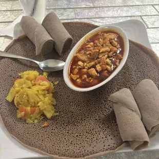Awaze ribs with cabbage and injera