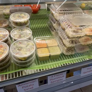 a variety of food in plastic containers