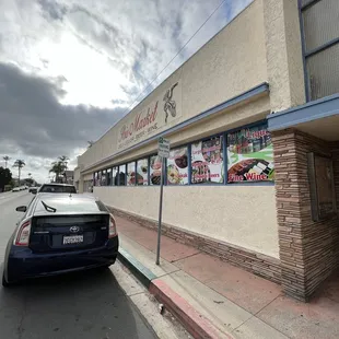 a car parked in front of the store