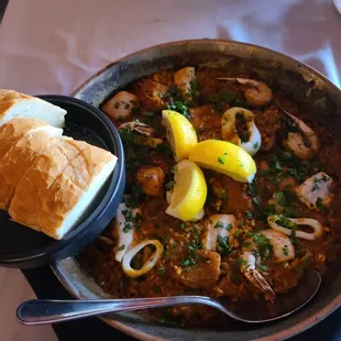 Chicken and seafood paella. Lacking flavor, but huge portion.