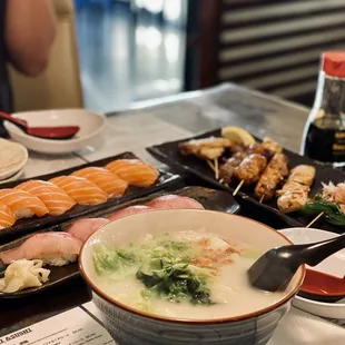 a bowl of sushi and a bowl of soup