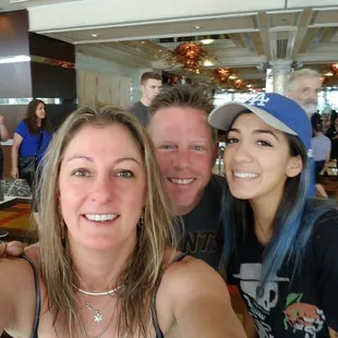 a group of people taking a selfie