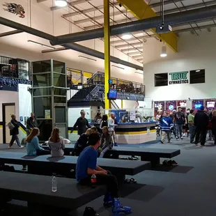 Large lobby area with bar in the back ground. Snack bar is on the right (but not in the shot)
