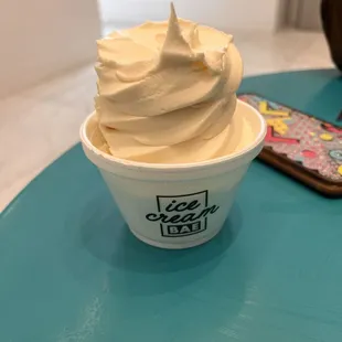 Small cup of vanilla (top eaten)