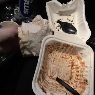 leftovers in a styrofoam container