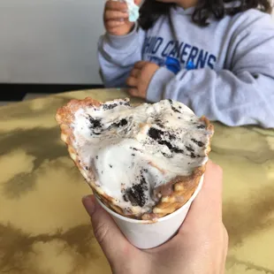 a child eating an ice cream cone