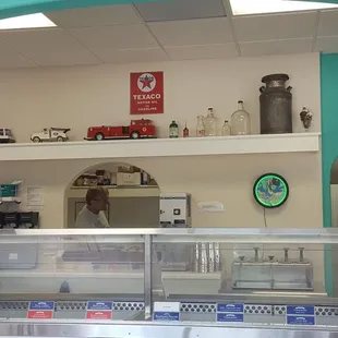 Front counter with a window to where the magic happens