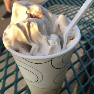a cup of ice cream on a table