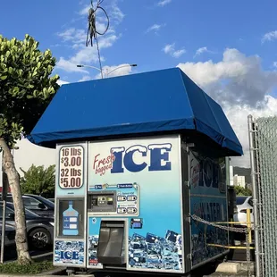 a vending machine on the side of the road