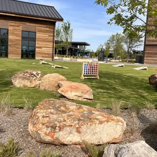 a lawn with rocks and rocks in the foreground