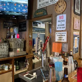 a bar with a television in the background