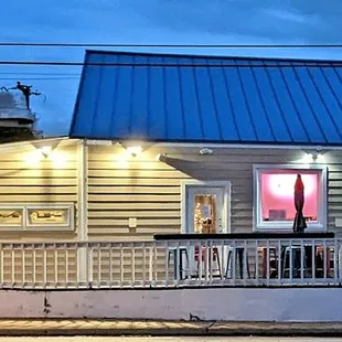 This is the view of the restaurant from the parking area across the street.  Photo taken December 5, 2022.