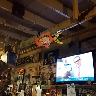 a large television in the background