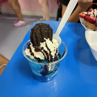 an ice cream sundae with chocolate and strawberries