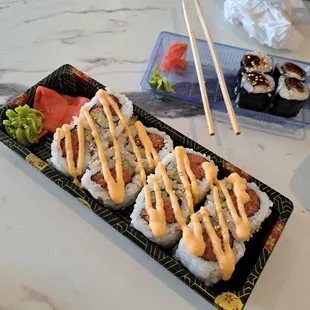 Spicy tuna roll and eel mai rolls