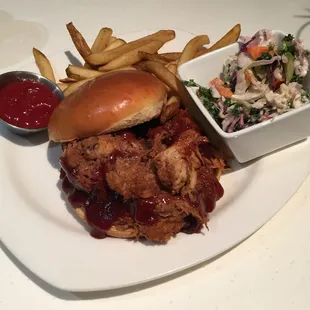 BBQ Pork sandwich with fries and cole slaw