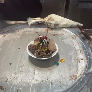 Rolled chocolate ice cream infused with Nutella and two toppings