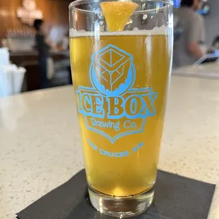 All Dogs Go to Hefen 5.5% ABV Classic German Hefeweizen style with clove and light banana esters, server with orange wedge