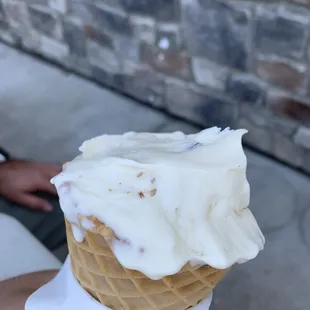 Butter pecan in a waffle cone with delicious vanilla.