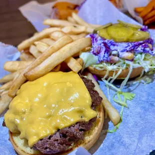 a hamburger and fries on a plate