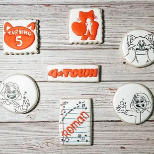a variety of decorated cookies