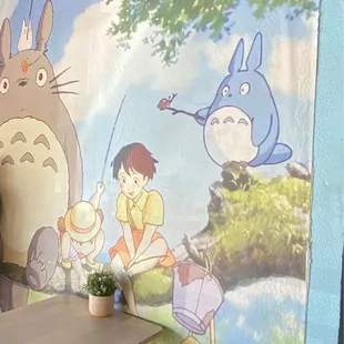 The Totoro art wall , you can't see it but right next to it are the Polaroids!