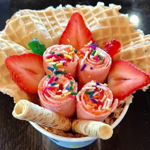 a waffle with strawberries and sprinkles