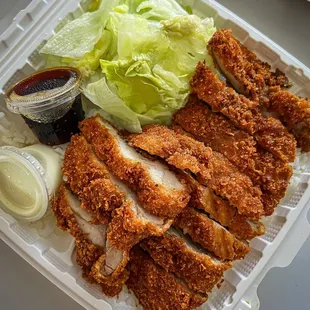 Part of $18.99 katsu bento, 3 piece shrimp tempura, 3pc Gyoza, miso soup, and 4pcs California roll