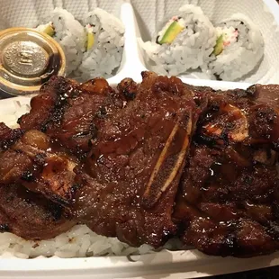 Short ribs and California roll with rice.