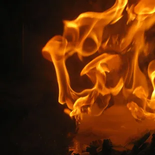 a fire burning in the dark