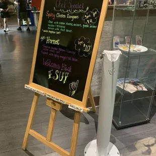 a chalk board with a menu on it