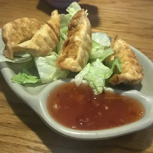 Gyoza (appetizer) you can get it fried or steamed. It comes with 5 for $3 and some change. They were really good!