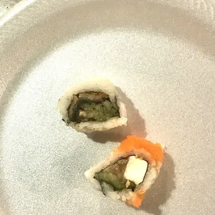 Look closely at the brown avocado and cucumber. How can the raw fish be safe ?