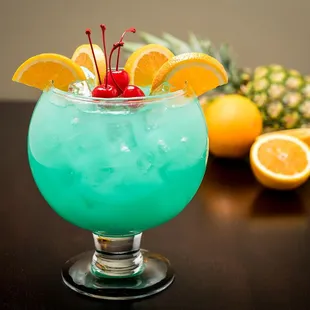 a tropical drink with a pineapple garnish