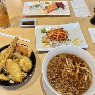 Sashimi dinner (top), Volcano roll (middle) and tempura udon.